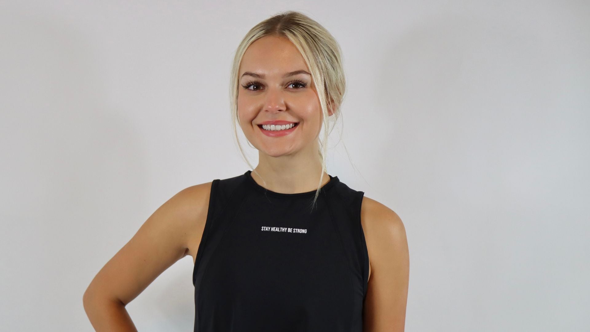 women wearing a black tank top