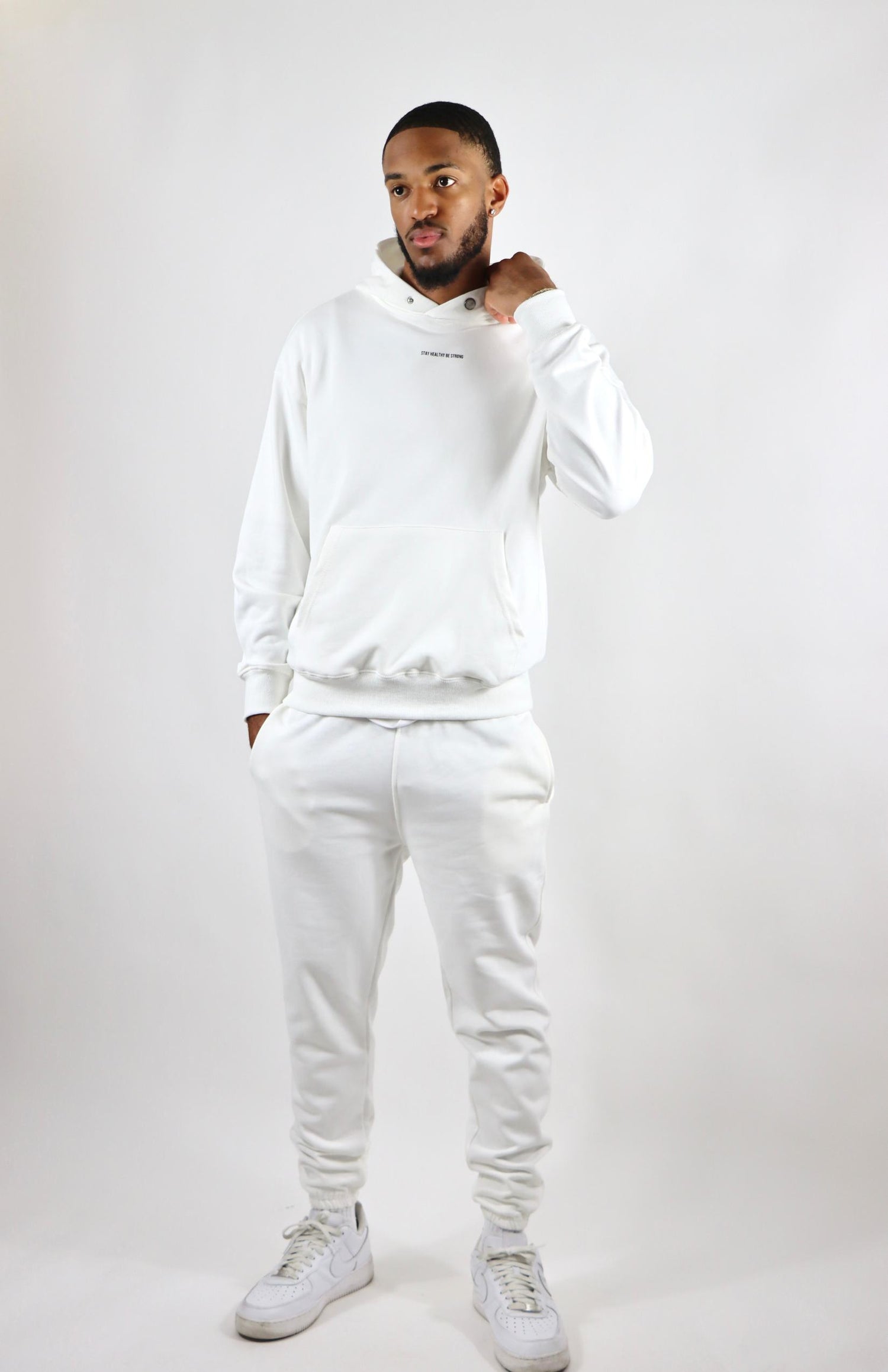 White oversized pullover hoodie with white oversized French Terry joggers