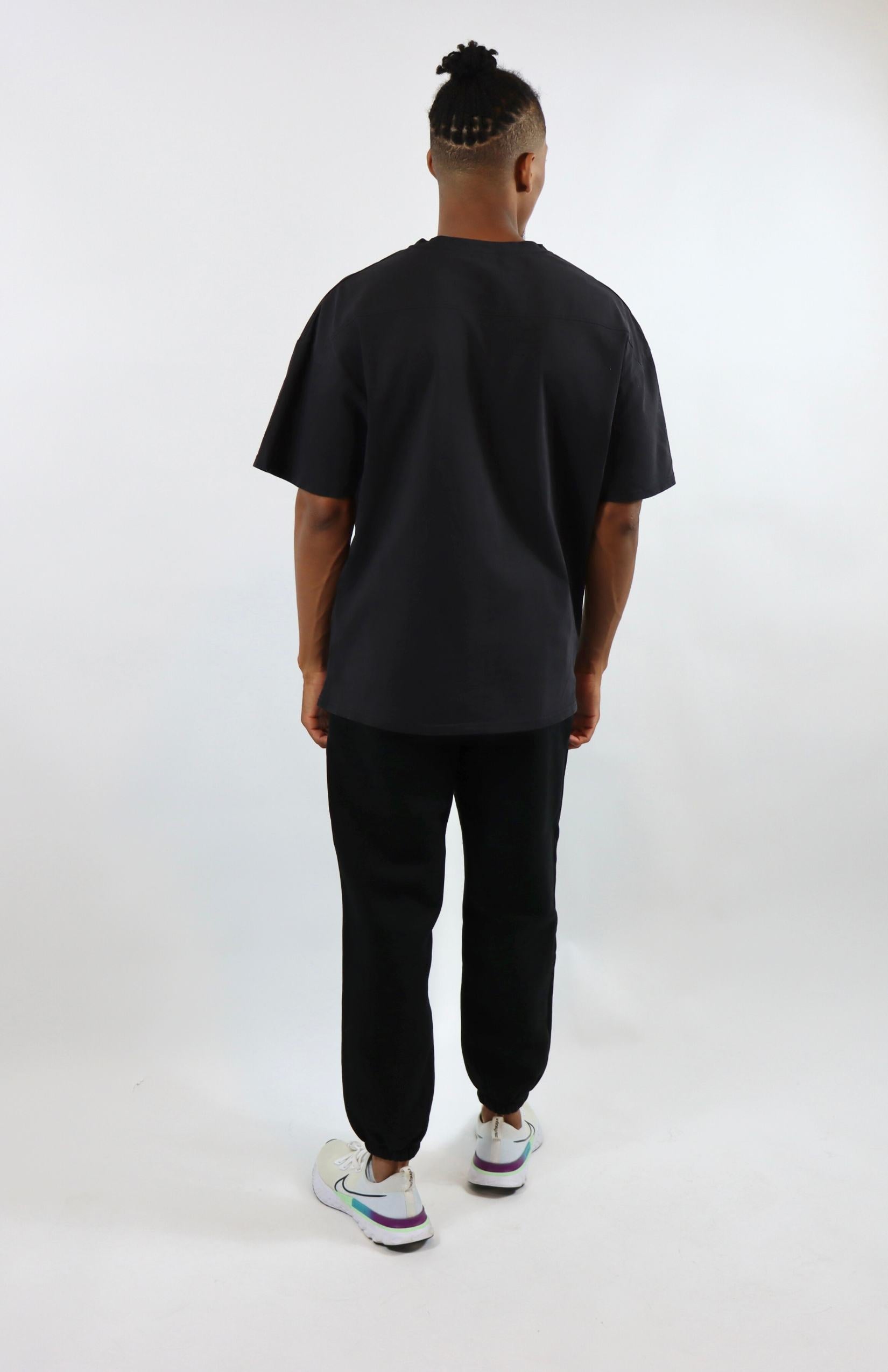 Faded black oversized sweatpants with faded black oversized T-shirt