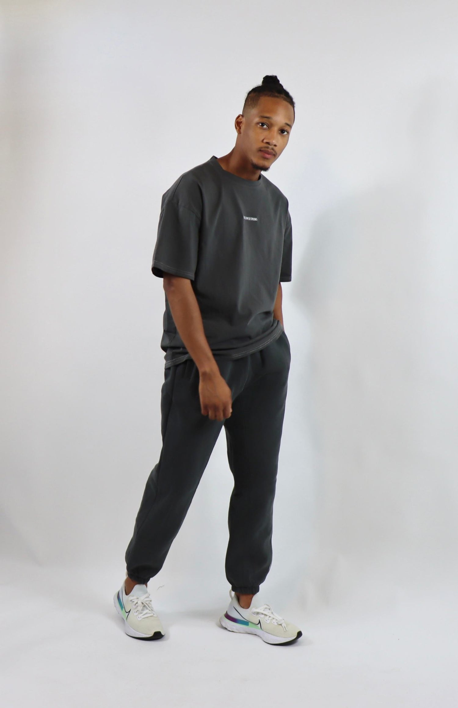 Faded gray oversized T-shirt with dark gray oversized sweatpants