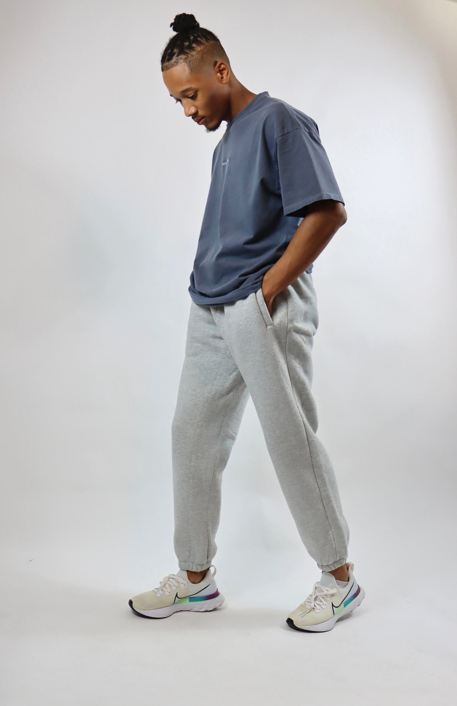 Light gray oversized sweatpants with faded blue oversized T-shirt