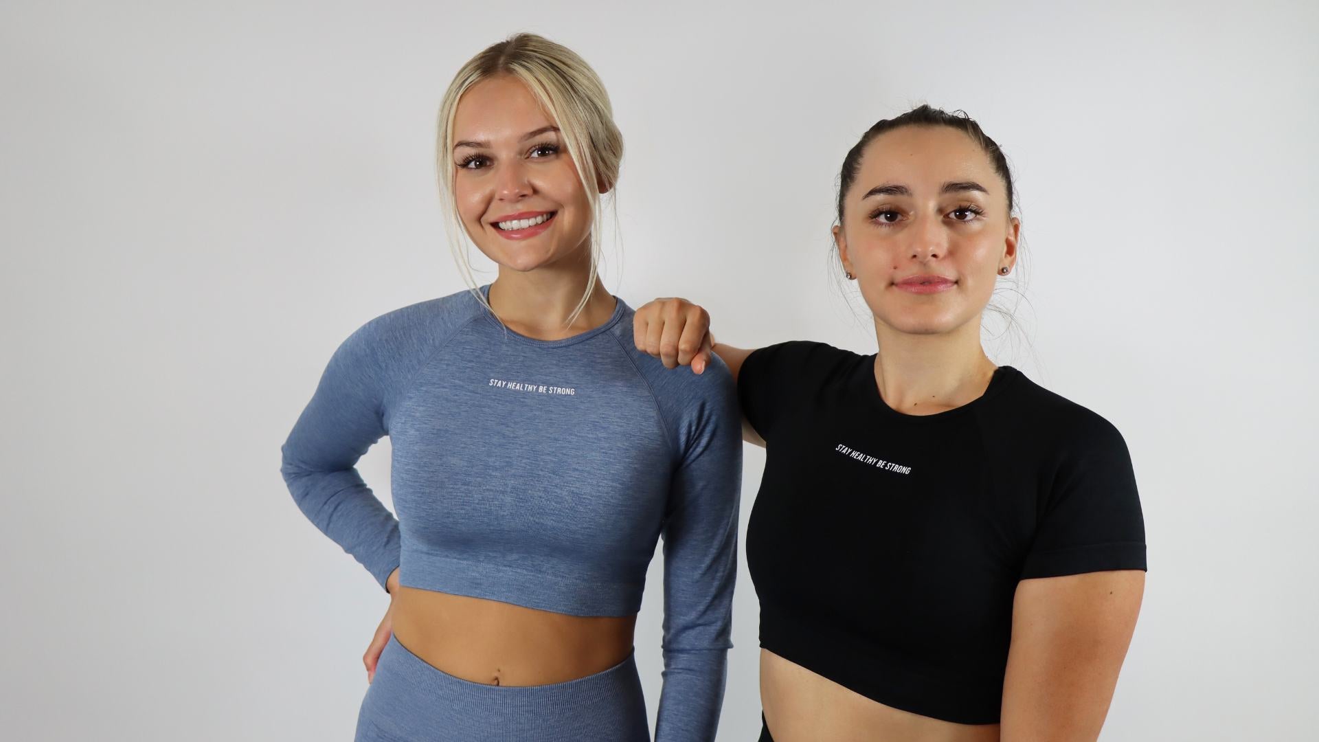 Fade blue amplify long sleeve crop top and black amplify shorts sleeve crop top