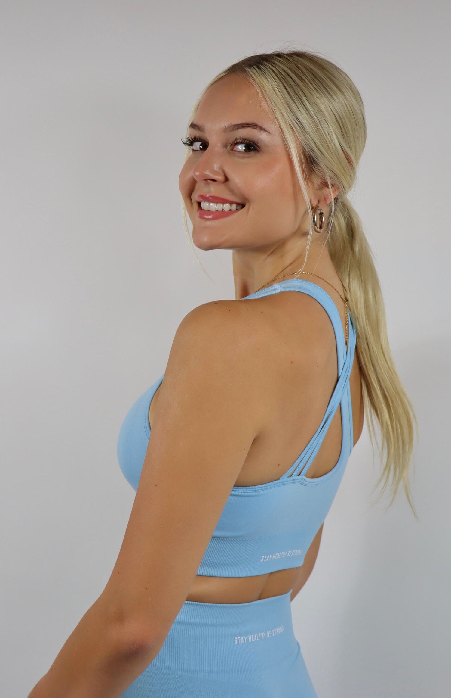 Baby blue cross back sports bra